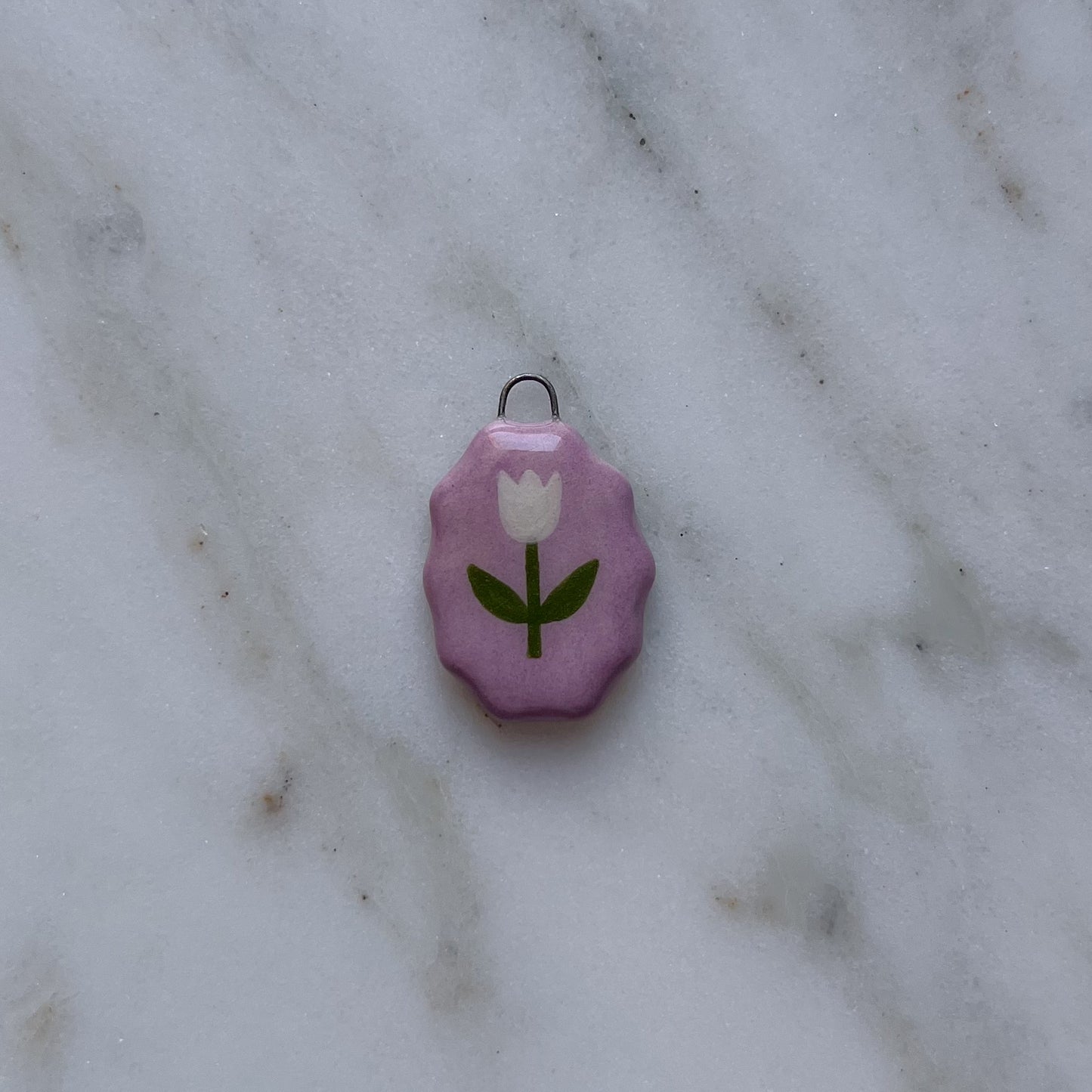 Medagliette ovali con bordo ondulato