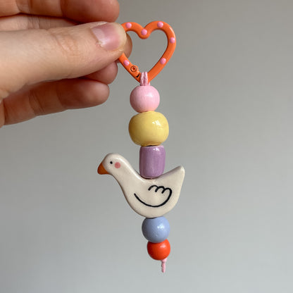 Bag charms con perline in ceramica