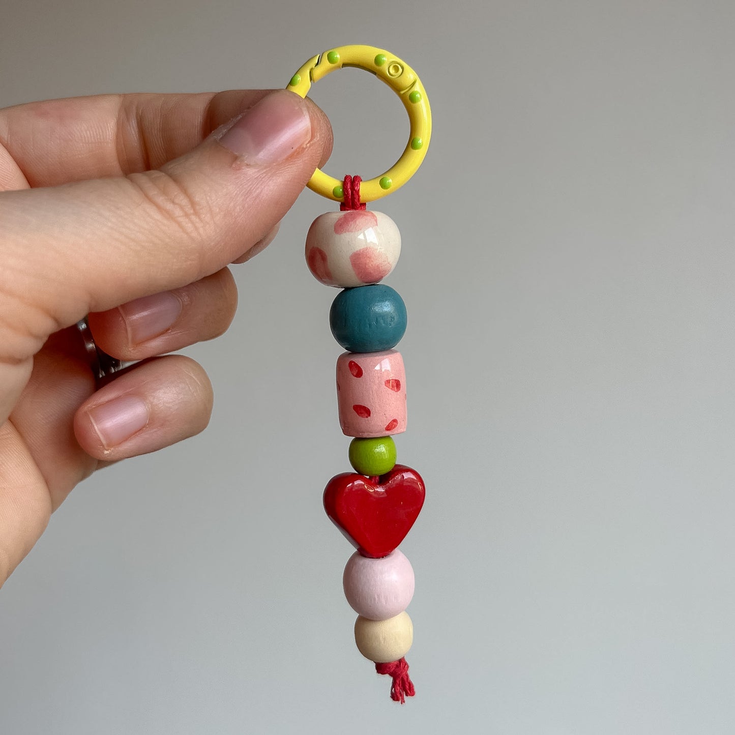 Bag charms con perline in ceramica