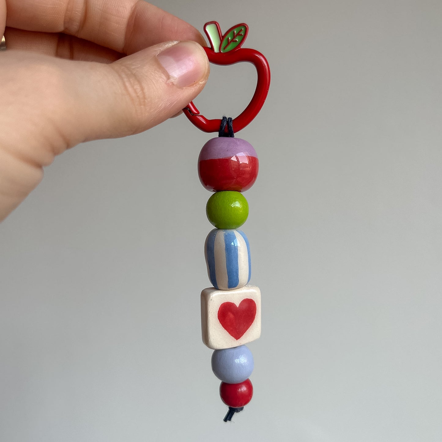 Bag charms con perline in ceramica