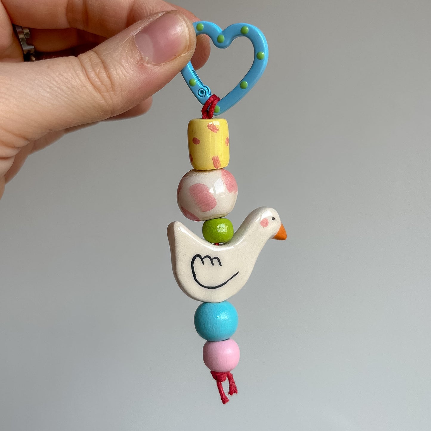 Bag charms con perline in ceramica