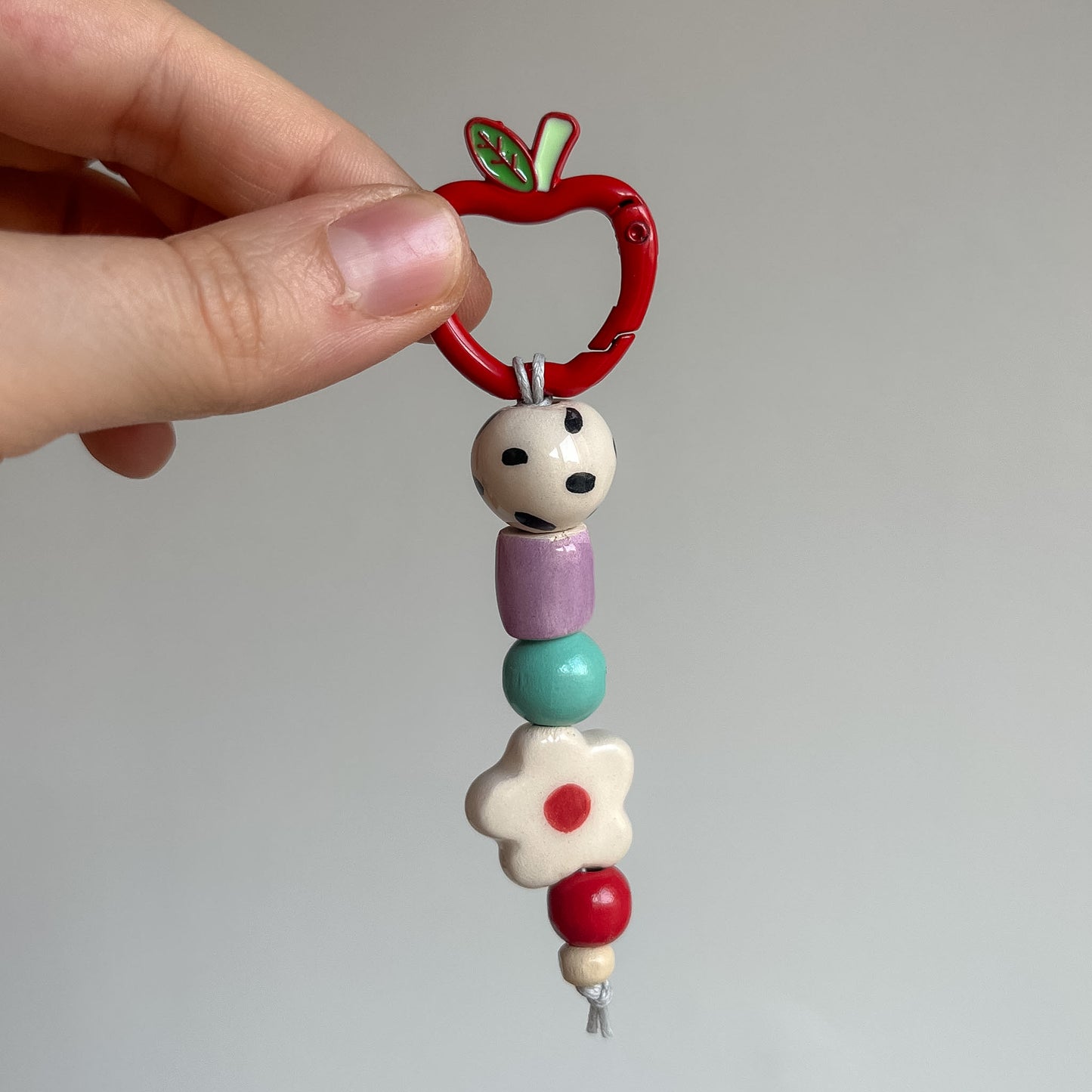 Bag charms con perline in ceramica