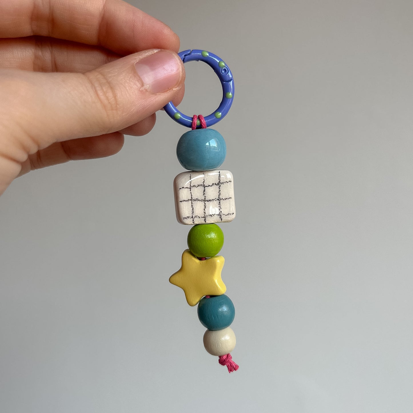 Bag charms con perline in ceramica