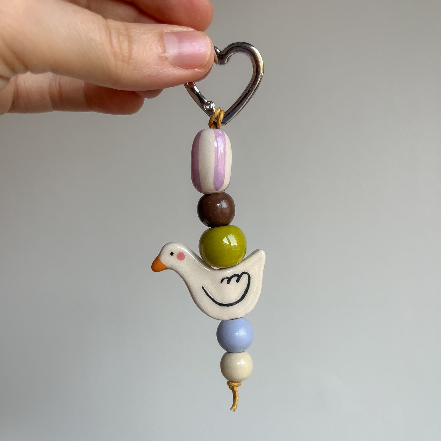 Bag charms con perline in ceramica
