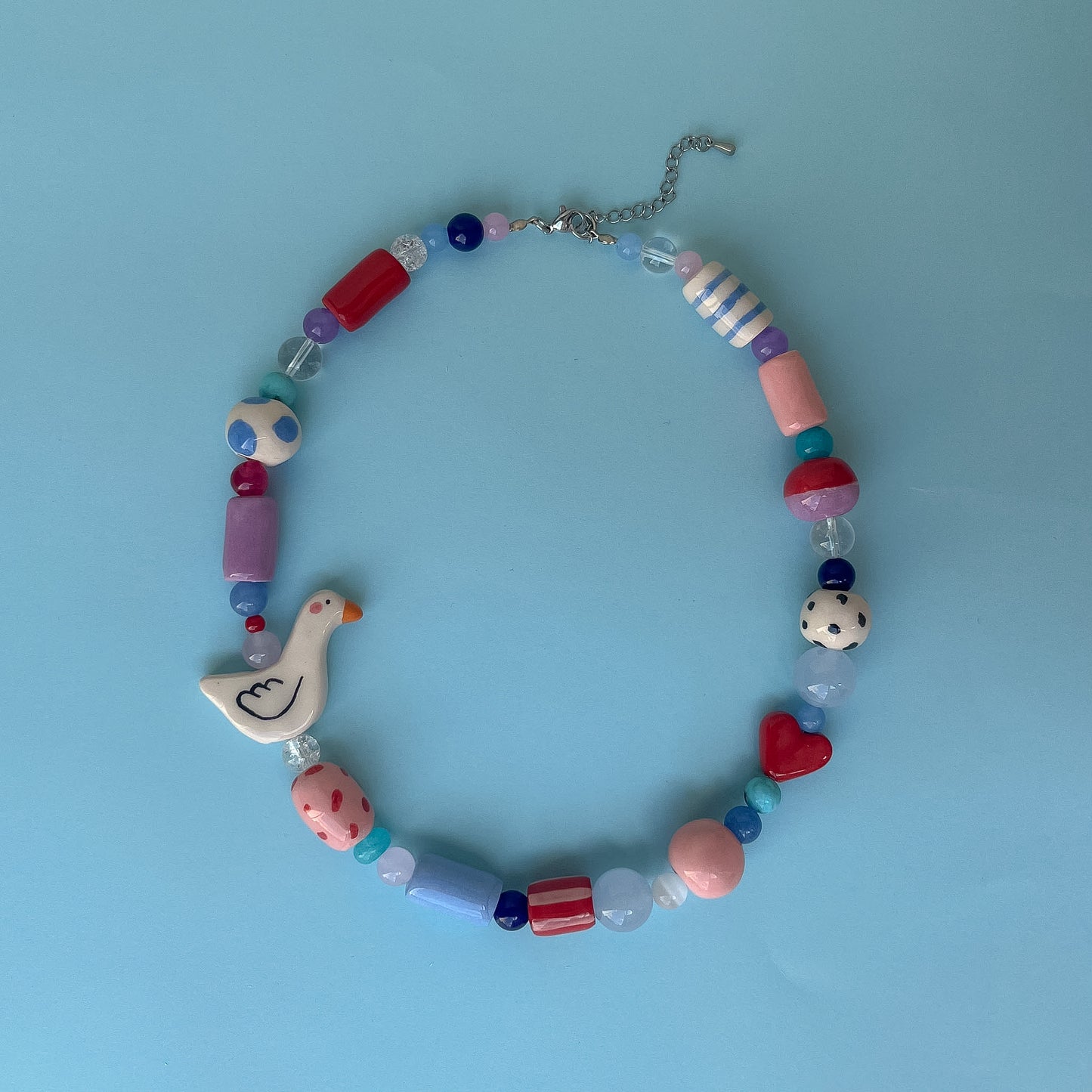 Collana con paperella e cuoricino