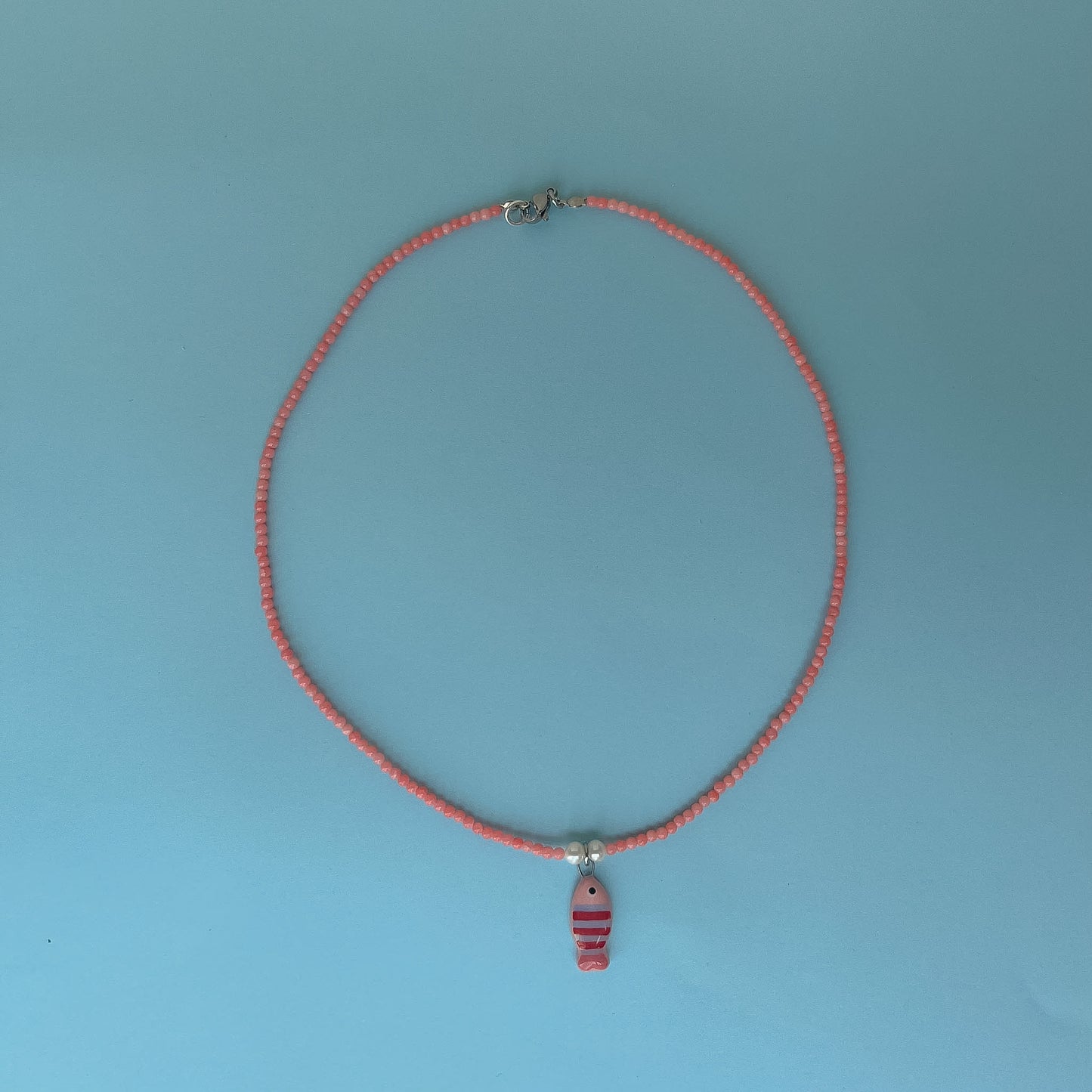 Collana in corallo rosa con pesciolino rosa