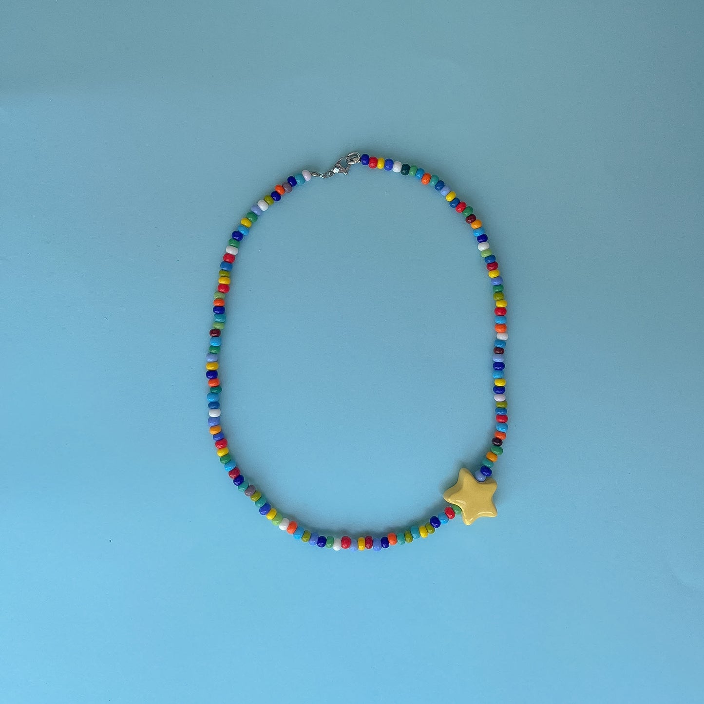 Collana colorata con perlina stella