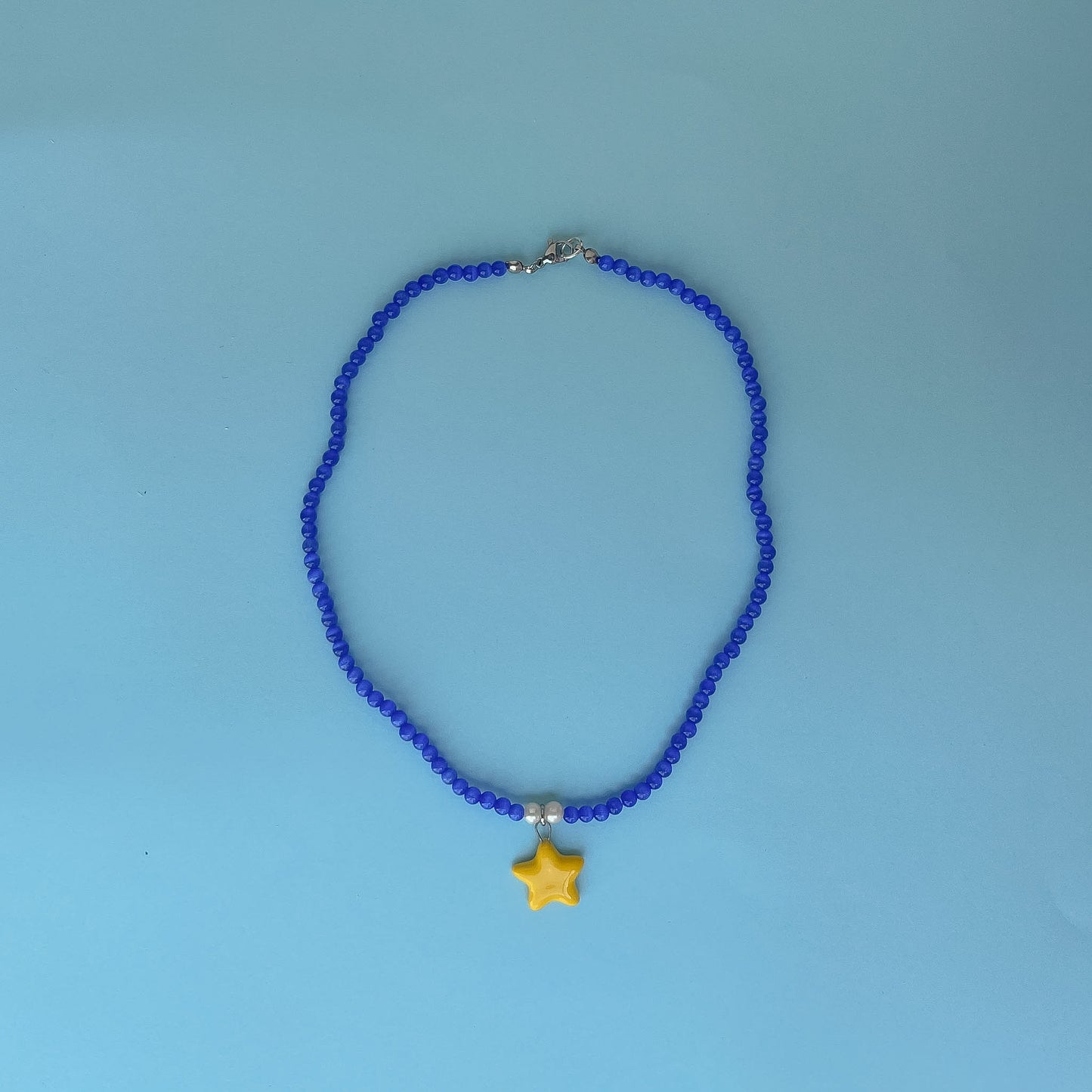 Collana blu con ciondolo stellina