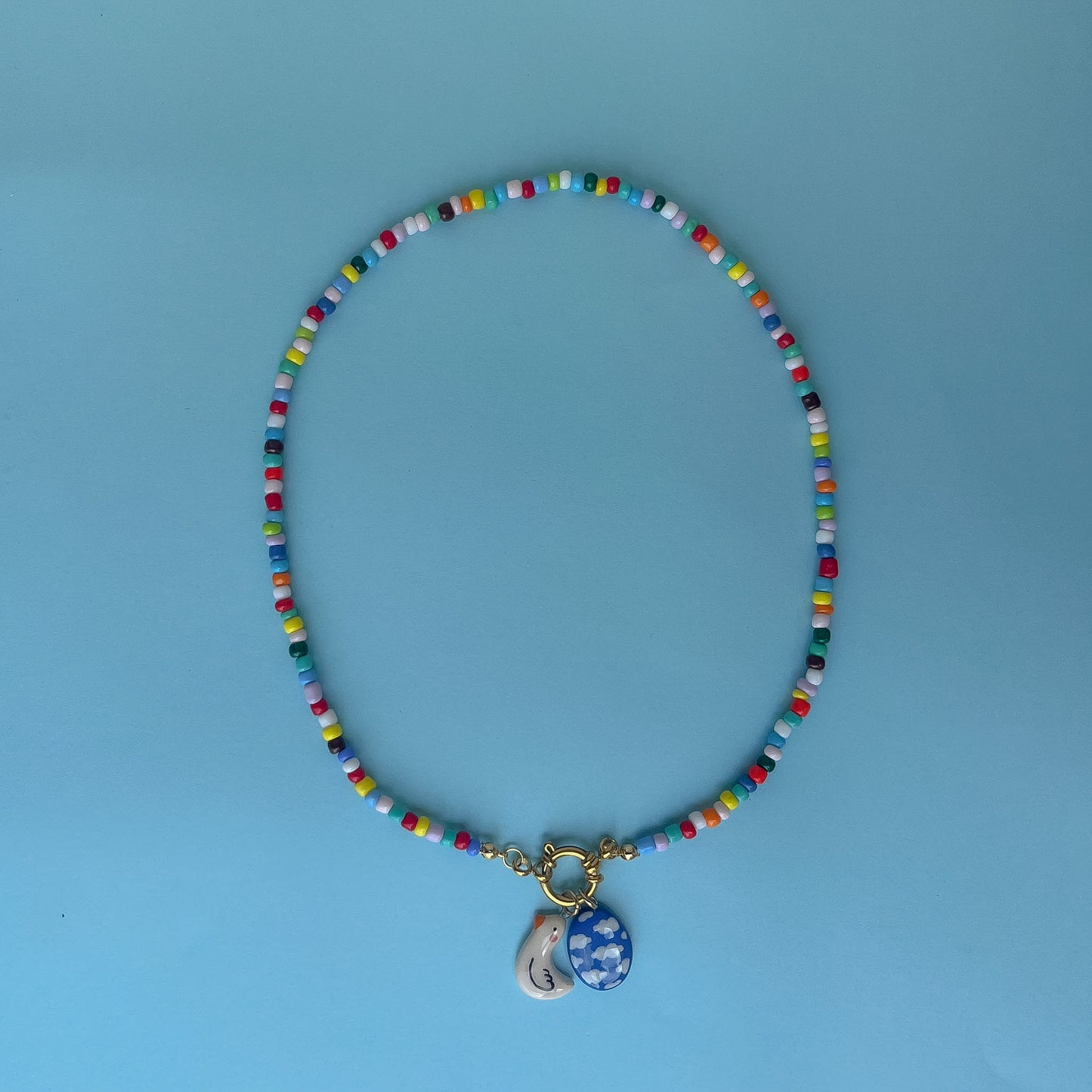 Collana colorata con ciondolo cielo e ochetta