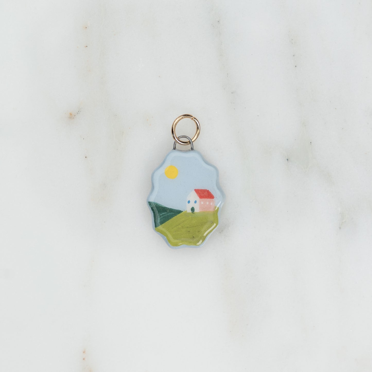 Ciondolo ovale con bordo ondulato