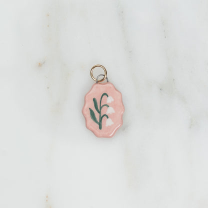 Ciondolo ovale con bordo ondulato