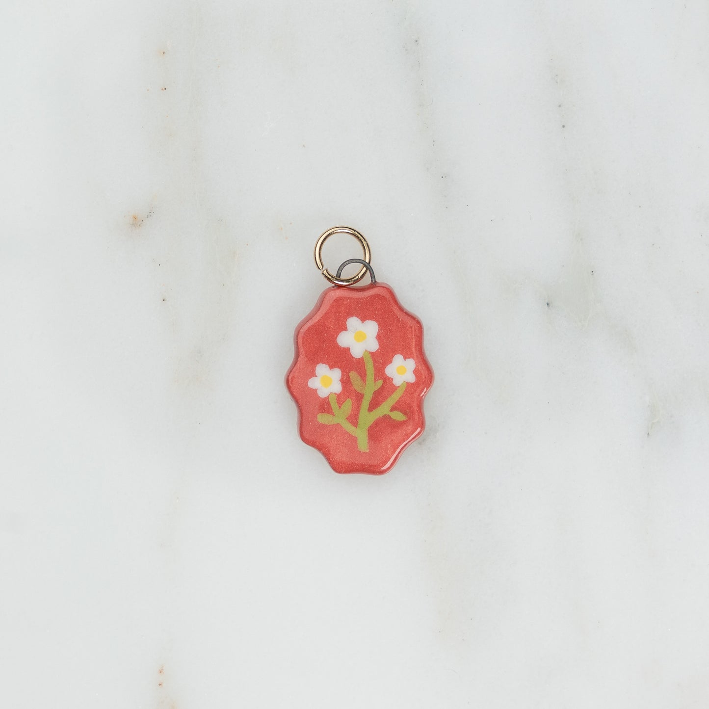 Ciondolo ovale con bordo ondulato