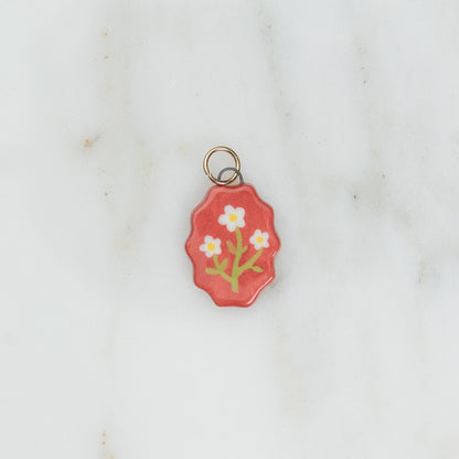 Ciondolo ovale con bordo ondulato