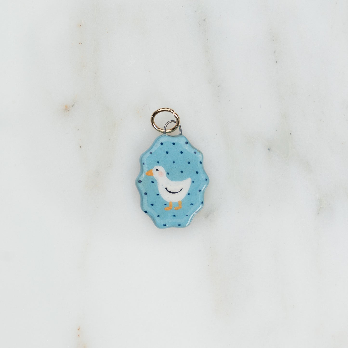 Ciondolo ovale con bordo ondulato