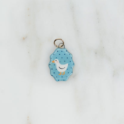 Ciondolo ovale con bordo ondulato