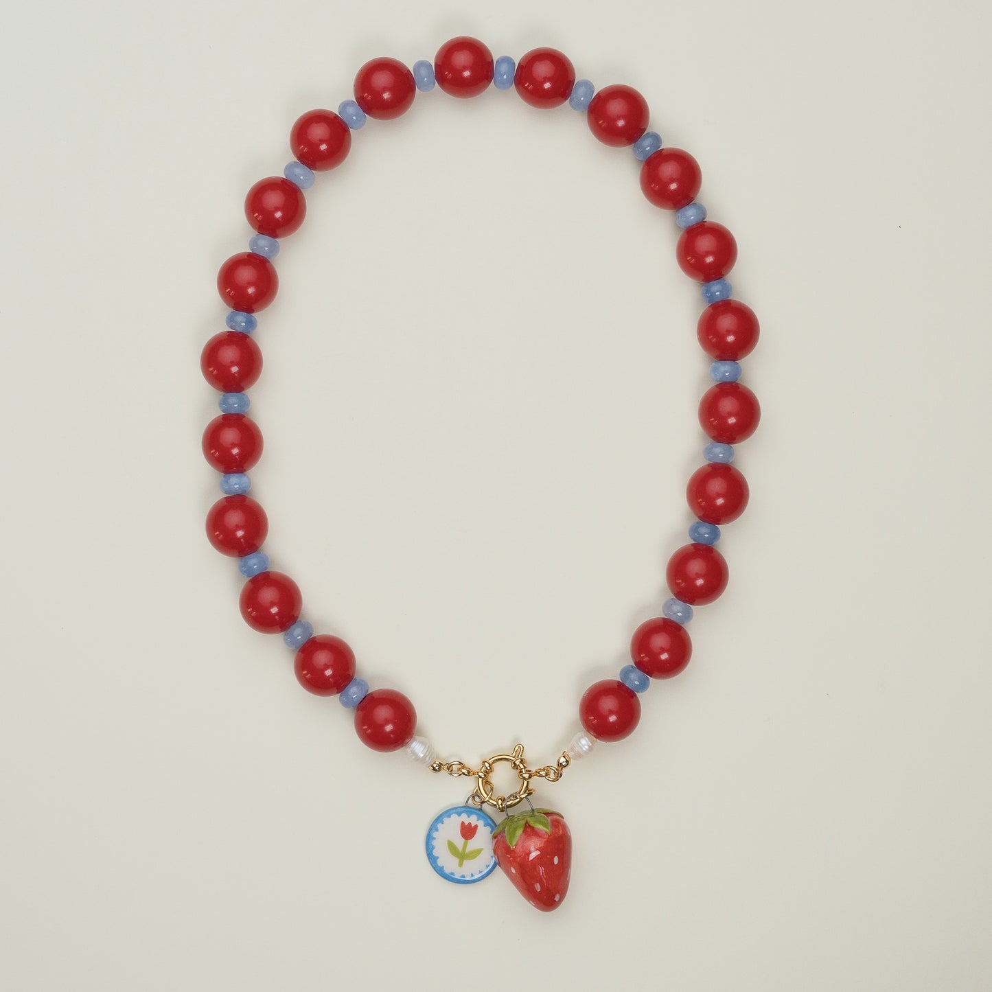 Collana con ciondolo fragola gigante e tulipano