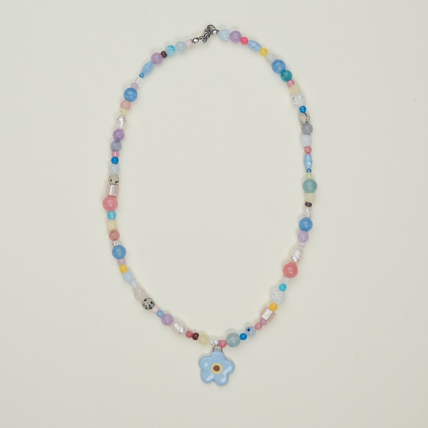Collana con ciondolo fiore azzurro