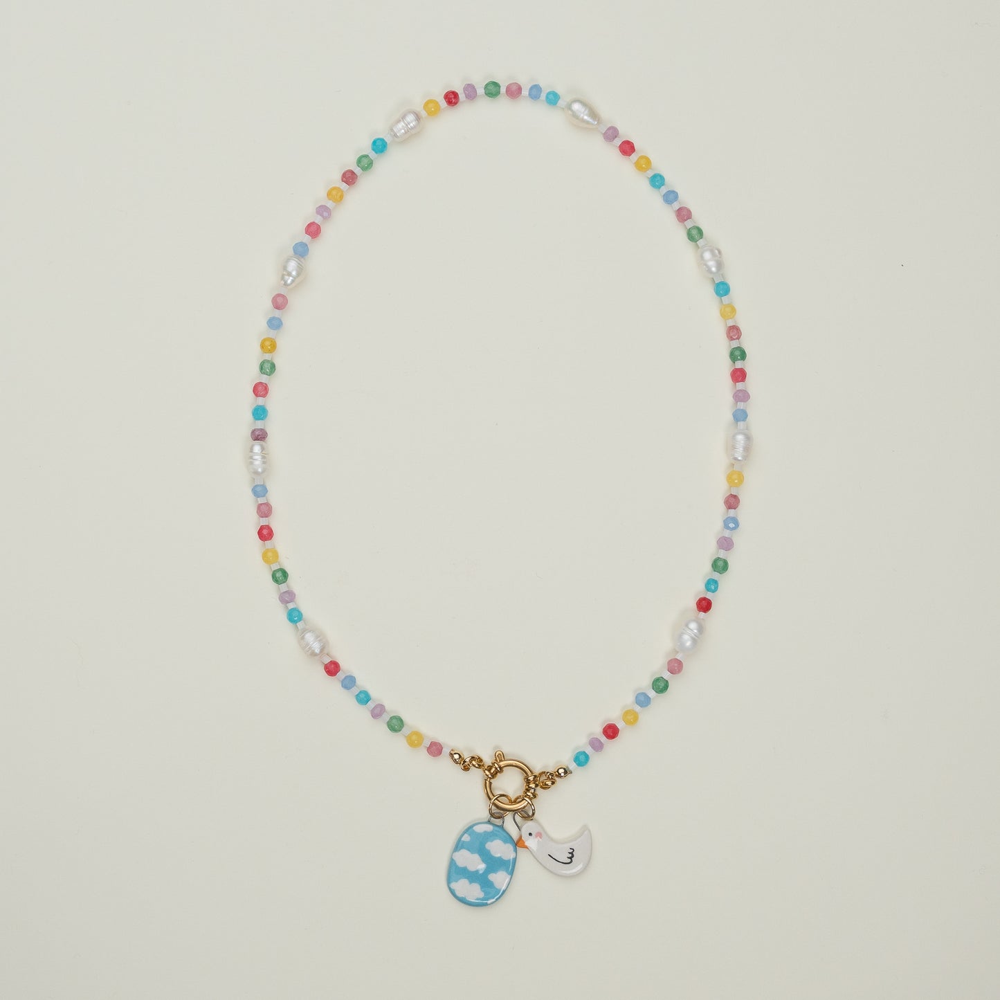 Collana di perline con coppia di ciondoli