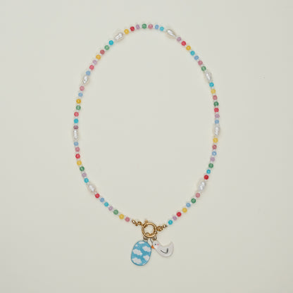 Collana di perline con coppia di ciondoli