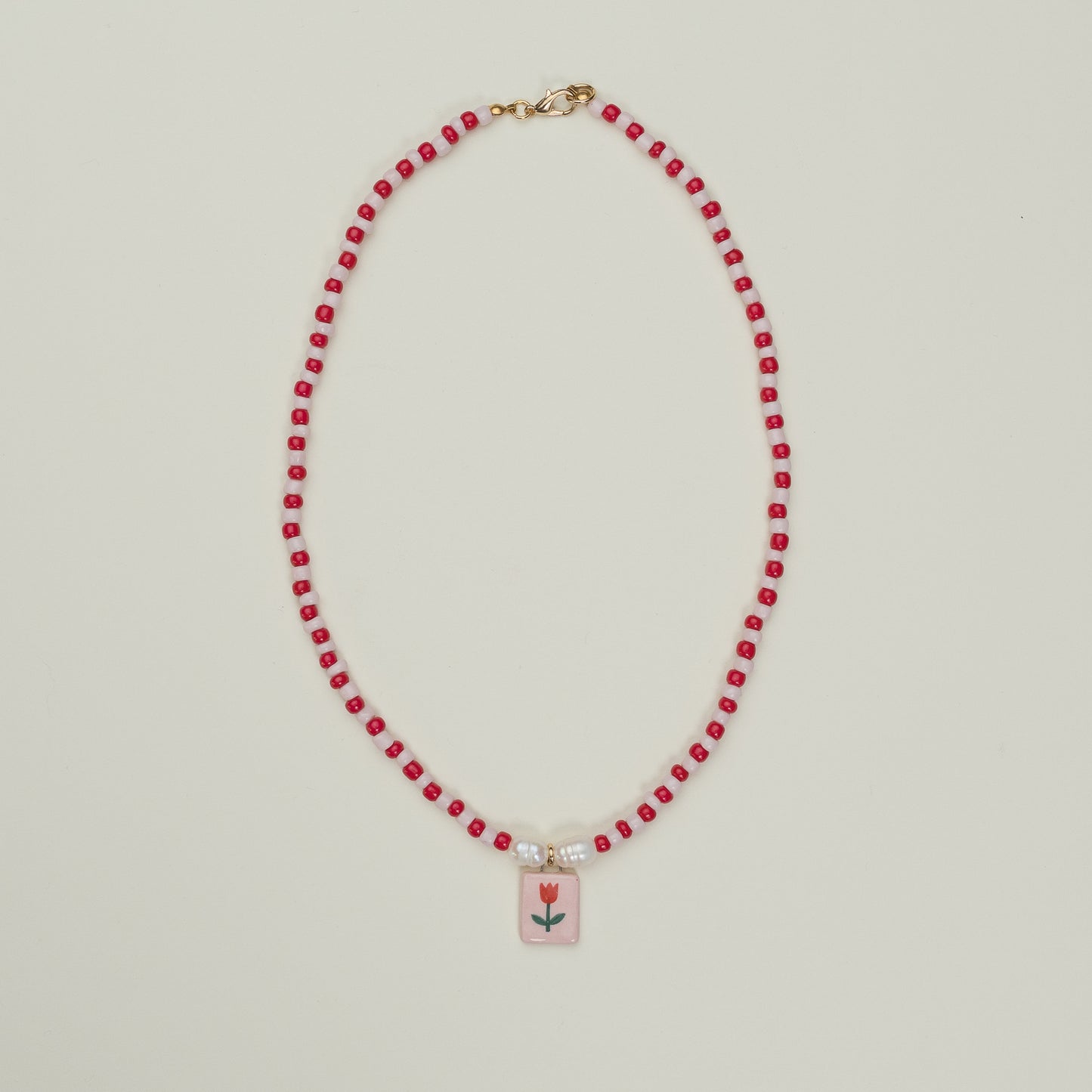 Collana di perline con ciondolo tulipano