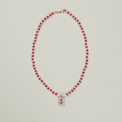 Collana di perline con ciondolo tulipano