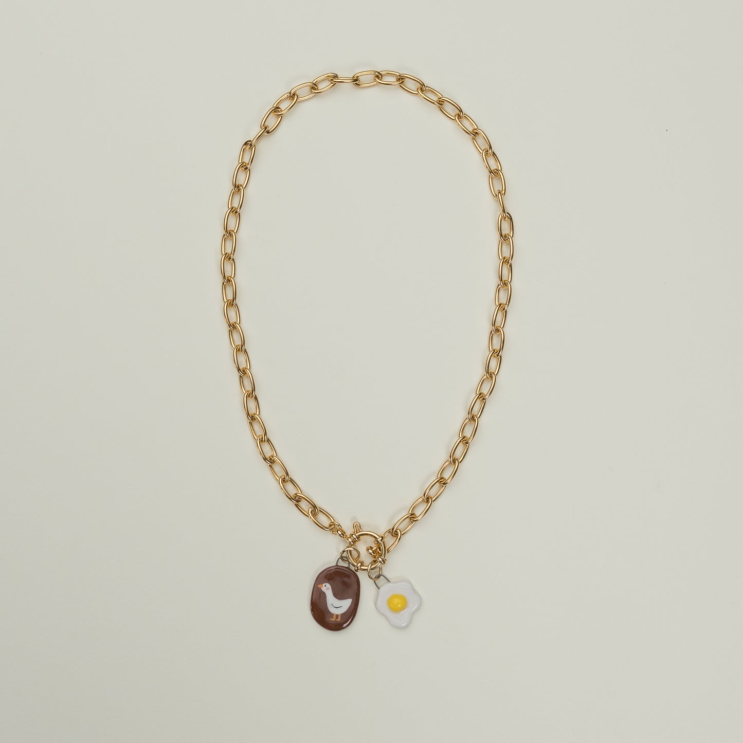 Catenella oro con ovetto e paperella