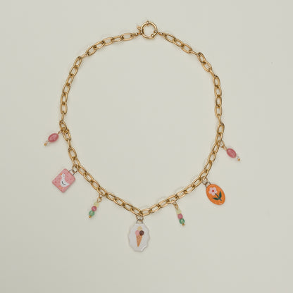 Catenella oro con ciondoli e perline