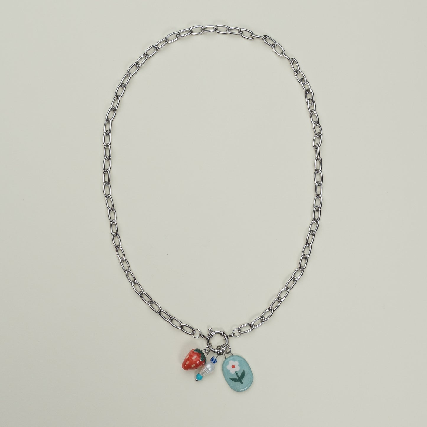 Catenella con moschettone e trio ciondoli