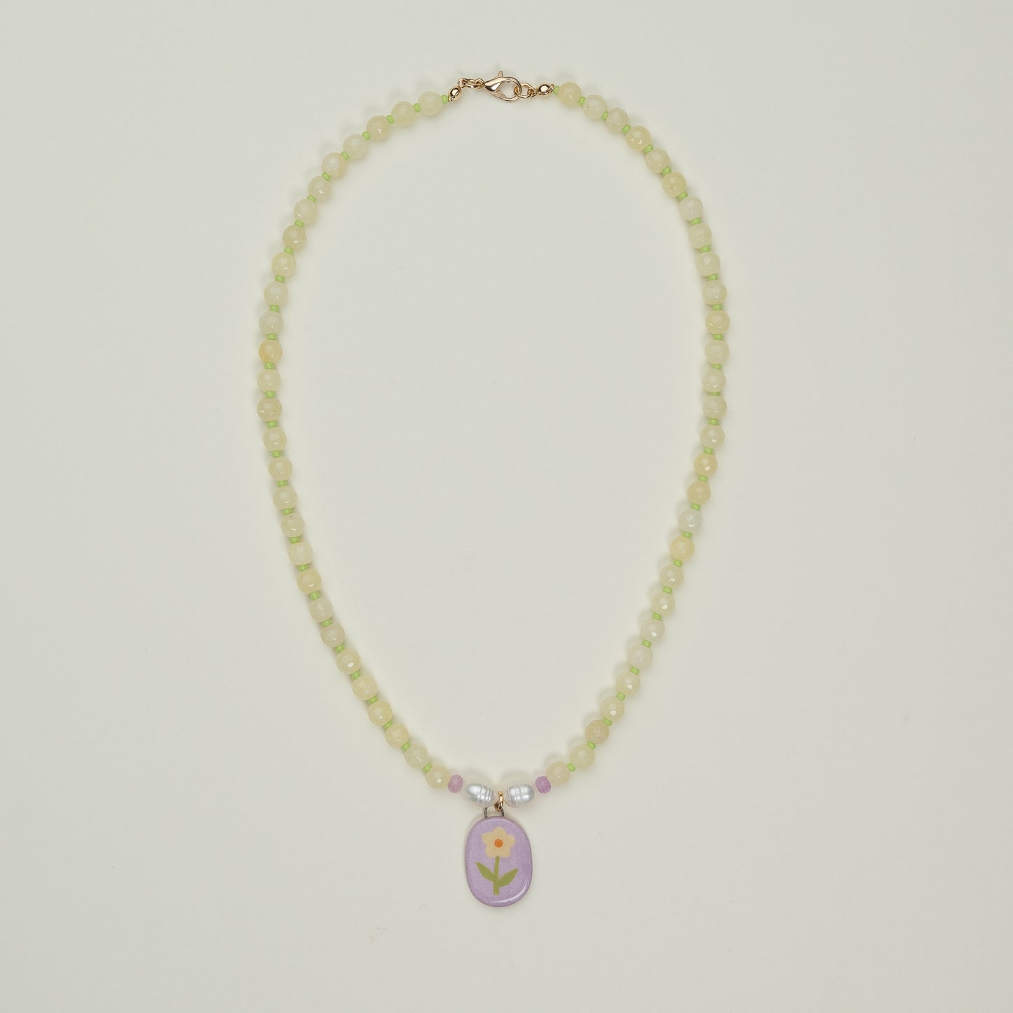 Collana con ciondolo fiore giallo