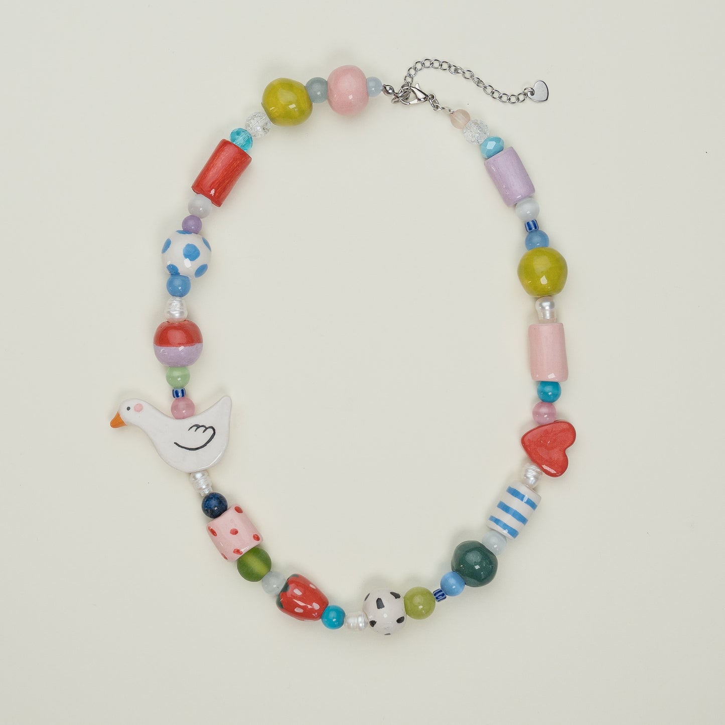 Collana con paperella e cuoricino