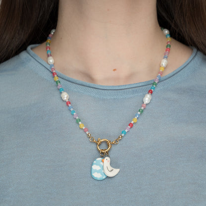 Collana di perline con coppia di ciondoli