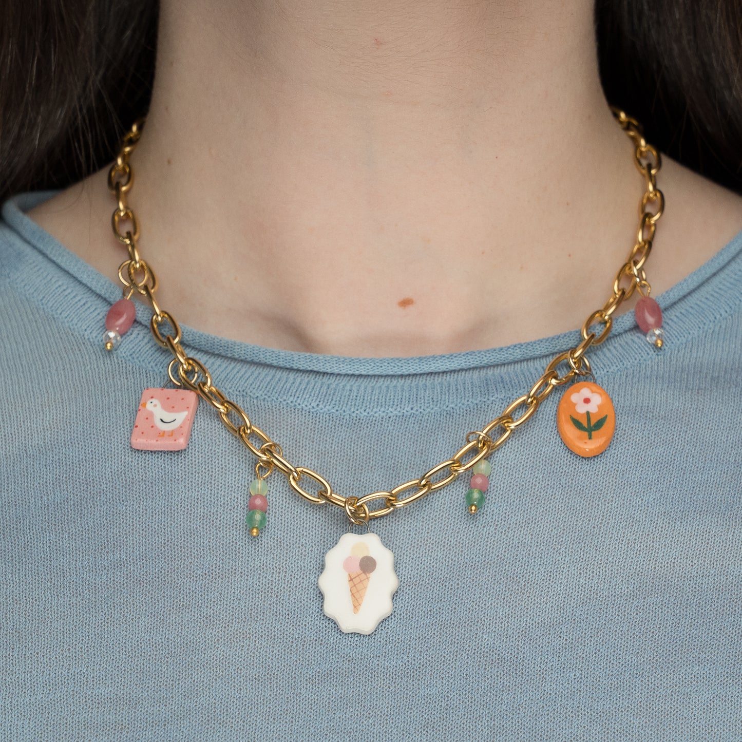 Catenella oro con ciondoli e perline