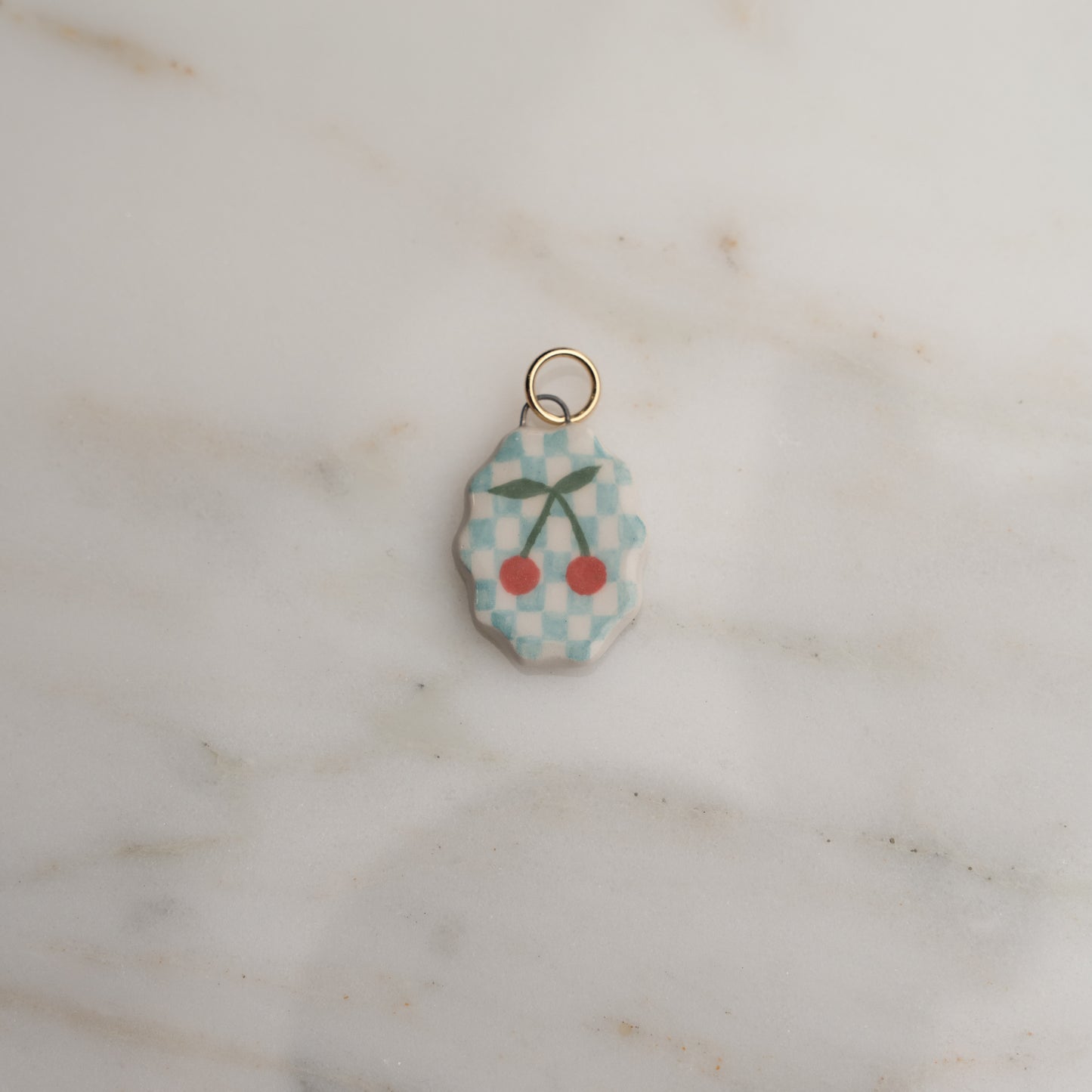 Ciondolo ovale con bordo ondulato