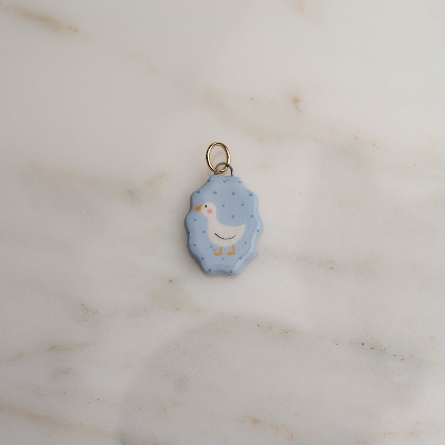 Ciondolo ovale con bordo ondulato