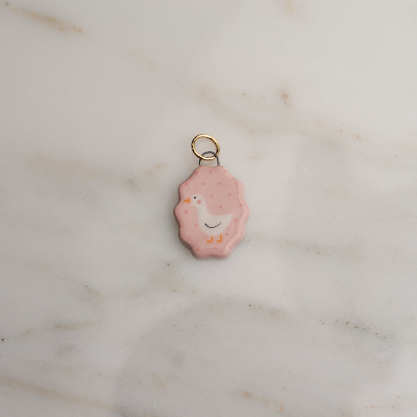 Ciondolo ovale con bordo ondulato