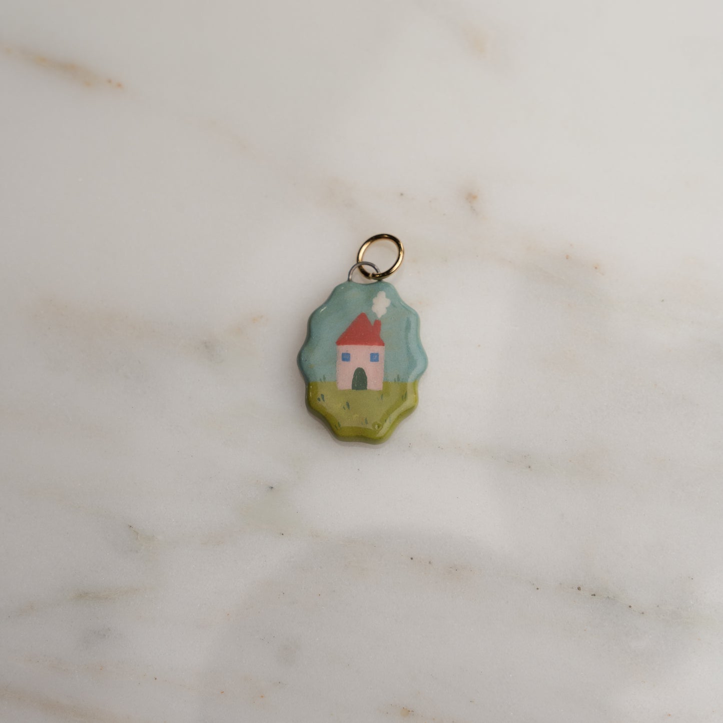 Ciondolo ovale con bordo ondulato