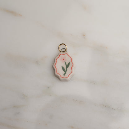 Ciondolo ovale con bordo ondulato