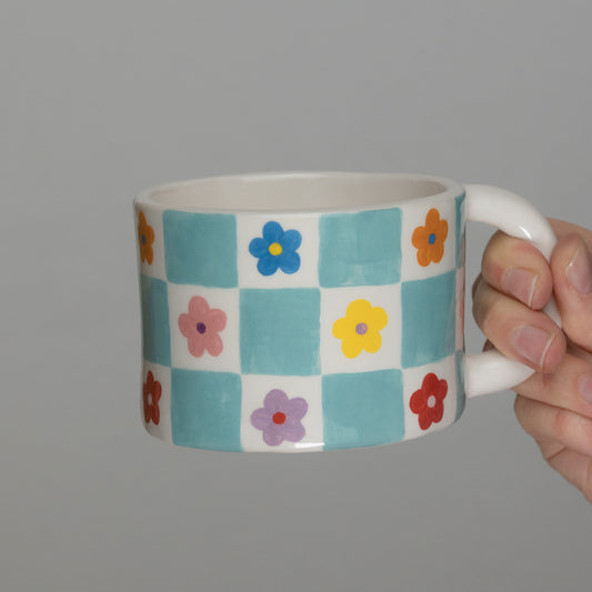 Tazza a scacchi con fiori