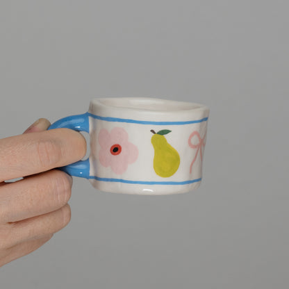 Tazzina con disegni e manico azzurro