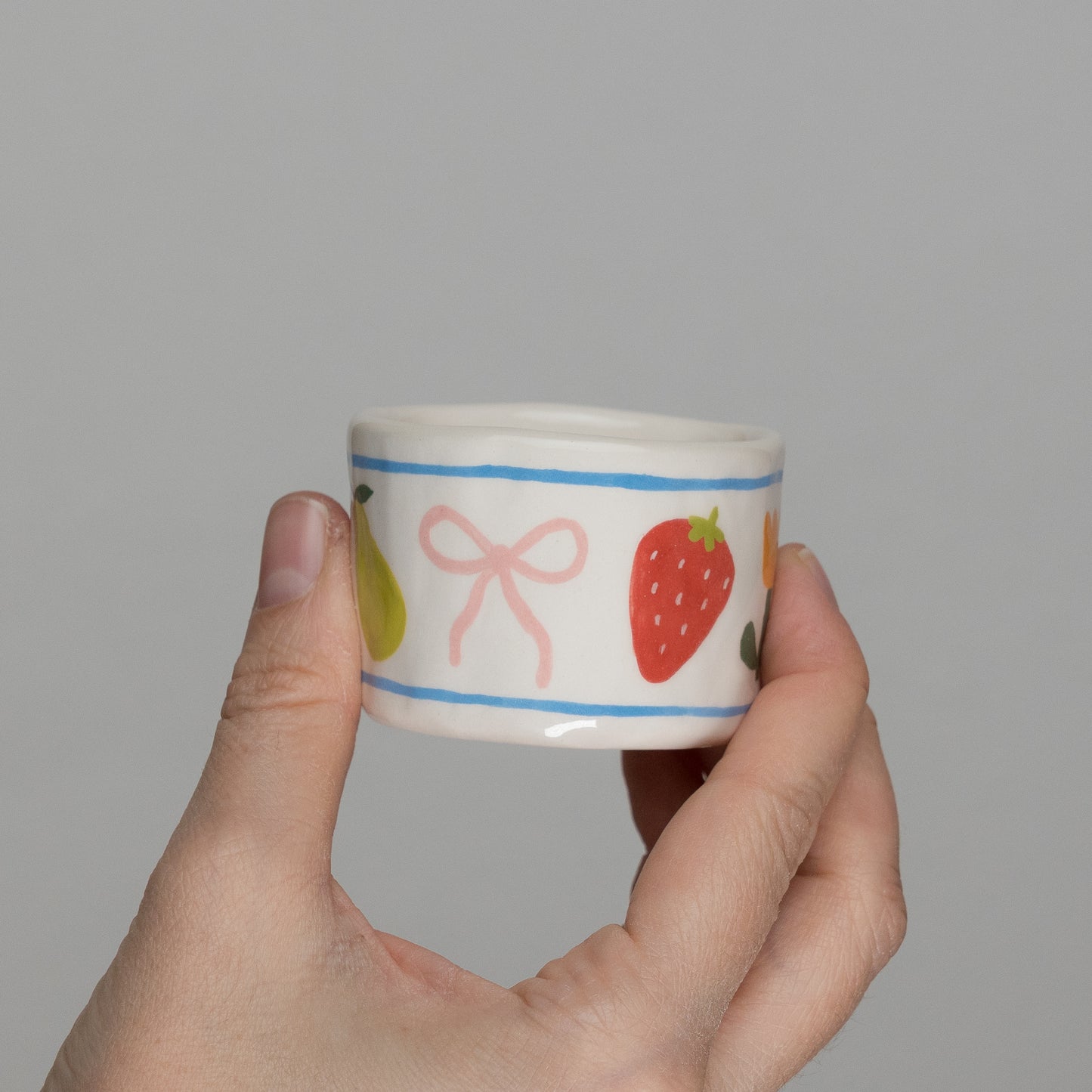 Tazzina con disegni e manico azzurro