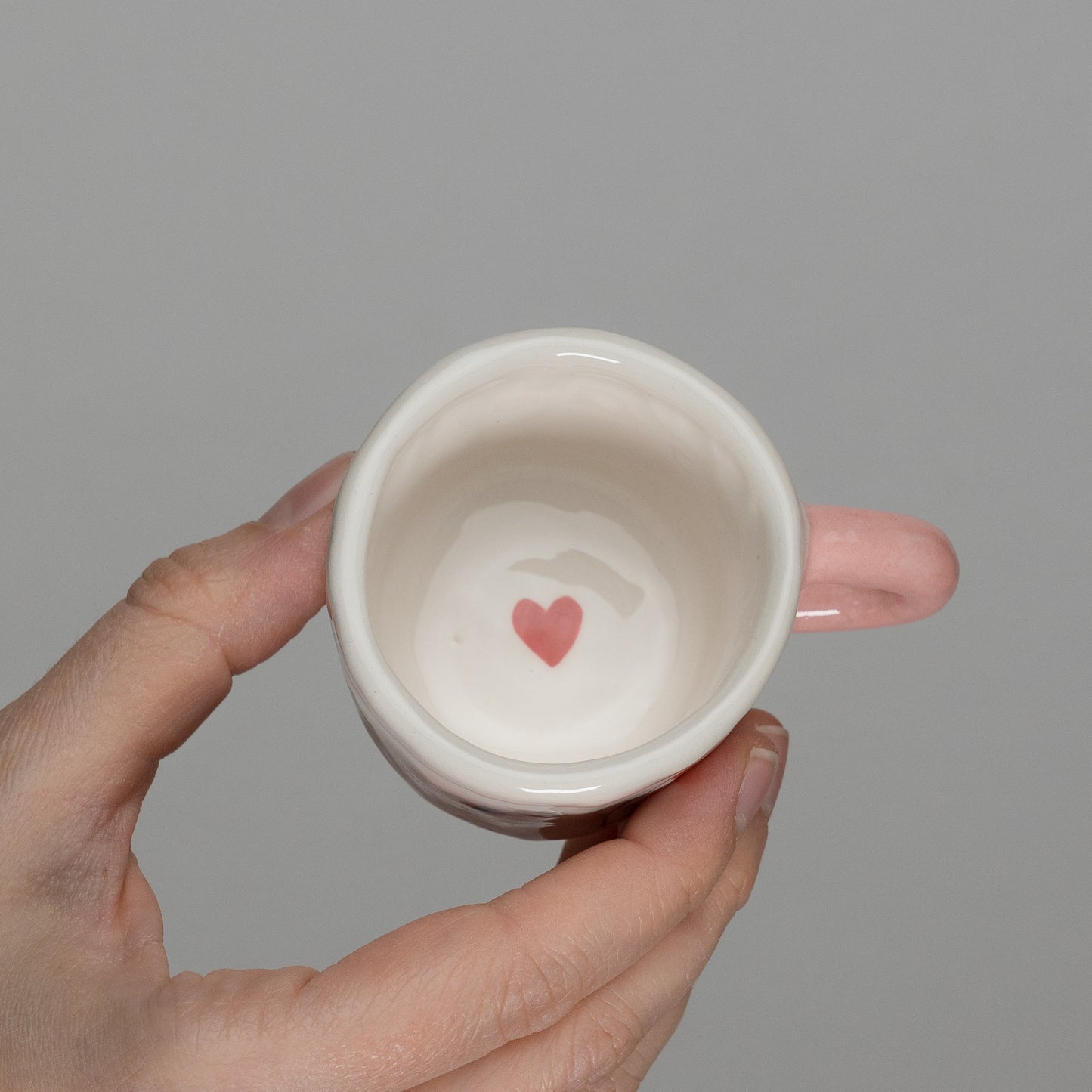 Tazzina con disegni e manico rosa