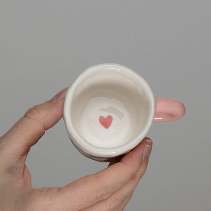 Tazzina con disegni e manico rosa