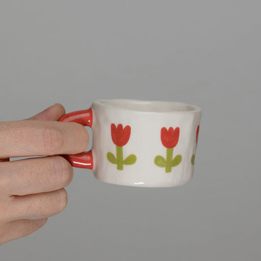 Tazzina con tulipani e manico rosso